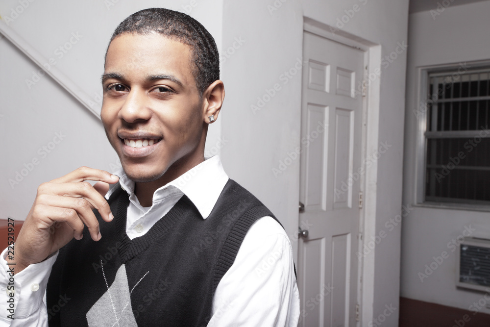 Handsome young African American teen smiling Handsome young African American teen smiling