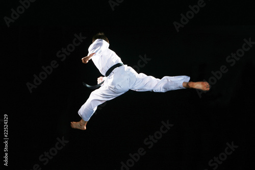 one asian man is playing with taekwondo © zhu difeng