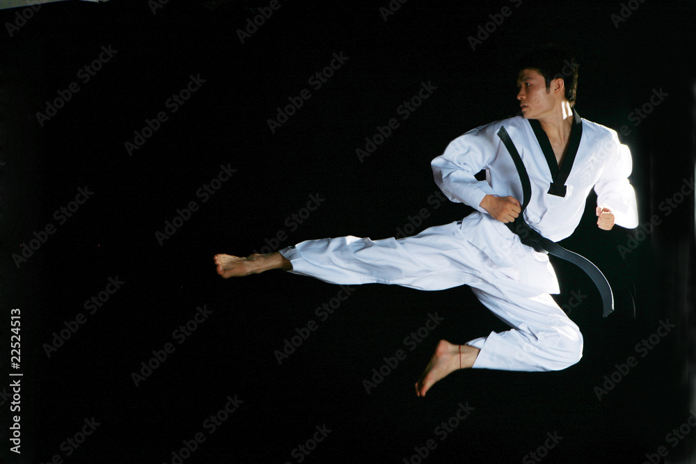 one asian man is playing with taekwondo one asian man is playing with taekwondo
