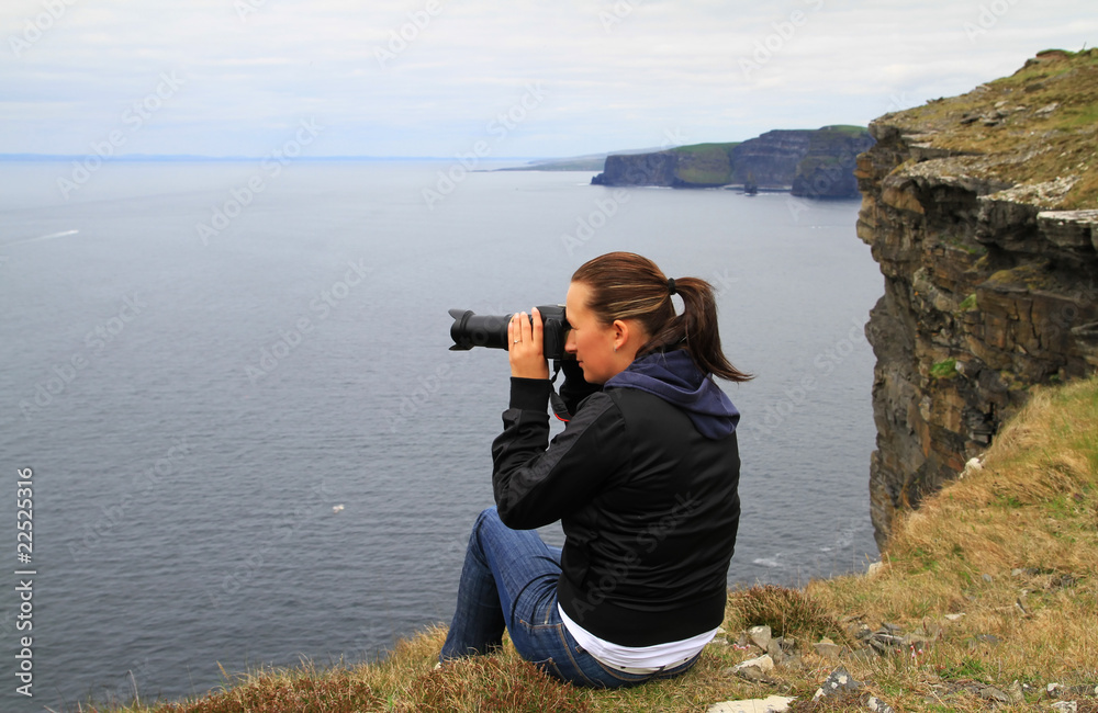 Photographer in irish scenery