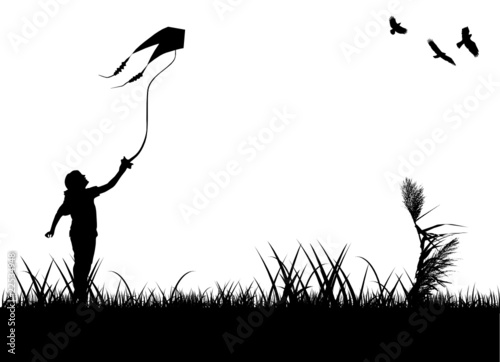kid flying kite