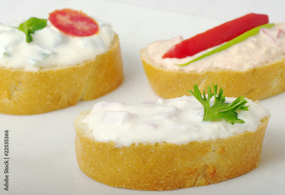 Baguette with Cream Cheese Spread (Selective Focus) Baguette with Cream Cheese Spread (Selective Focus)