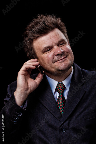 businessman with mobile phone speaking