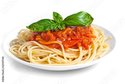 pasta tomato with basil on the top, isolated on white