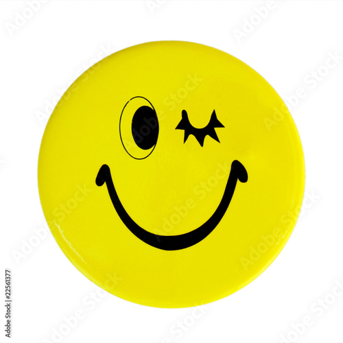 Smiley Face Button isolated on a white background.