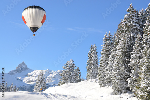Balloon over snowy scenery