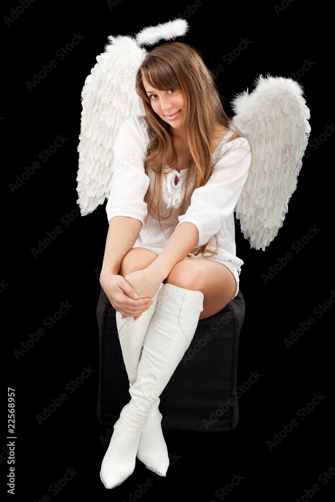 beautiful blonde angel against black background beautiful blonde angel against black background