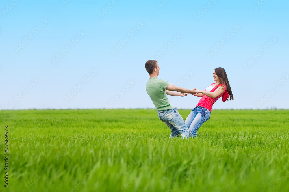 Couple holding by hands and whirling Couple holding by hands and whirling