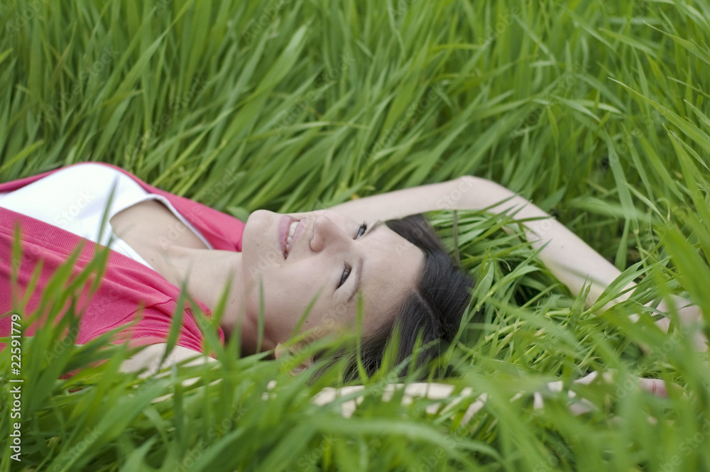 Girl lying on the grass Girl lying on the grass