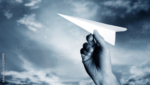 throwing a paper plane..