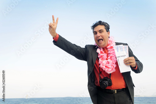 ready  for  a  holiday: businessman on the beach photo