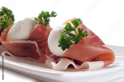 slice parma ham with mozzarella