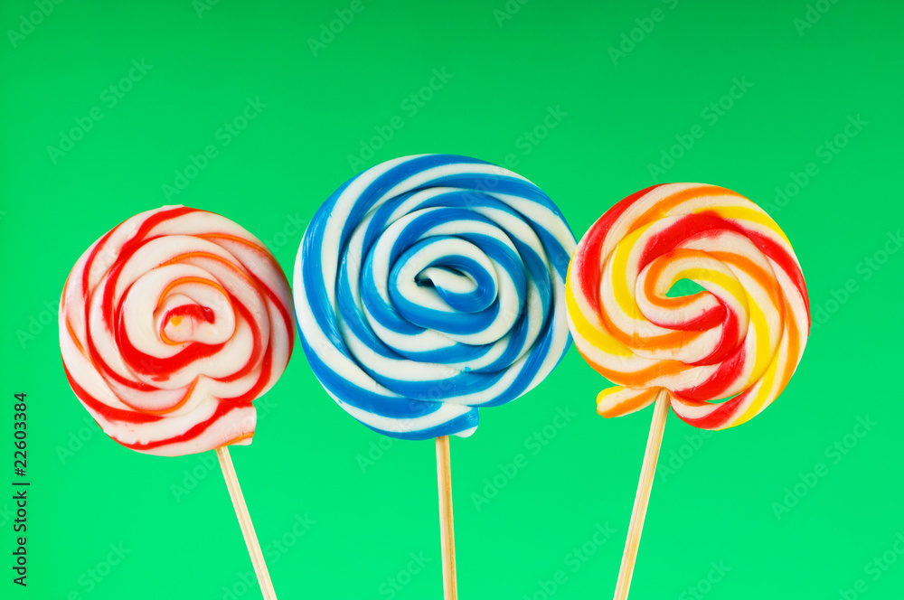 Colourful lollipop against the colourful background Colourful lollipop against the colourful background