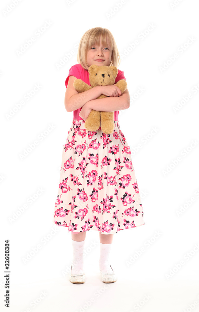 Young little girl cuddling teddy bear Young little girl cuddling teddy bear