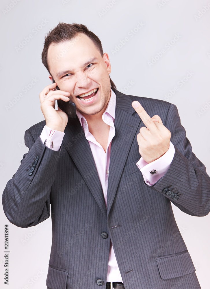 Portrait of business male model showing his love to you. Portrait of business male model showing his love to you.