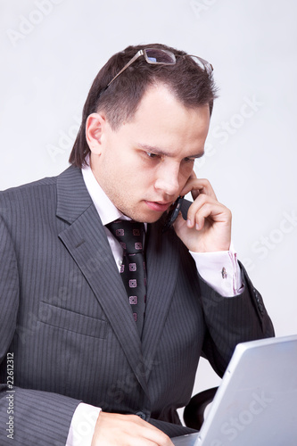 Young businessman sitting on chair