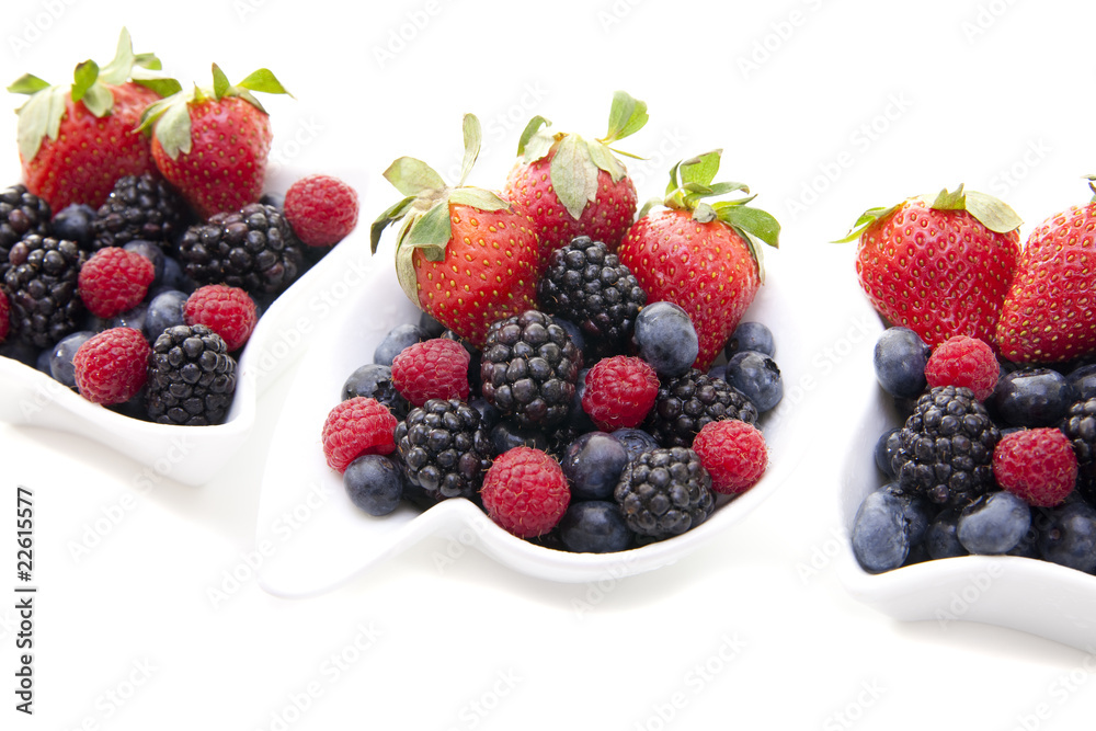 Fresh berries in bowls