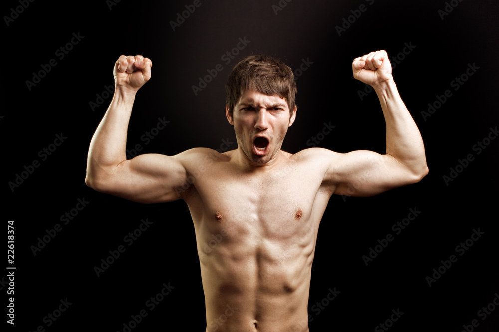 Scream of angry muscular brave strong man