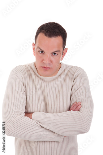 man upset with his arms crossed