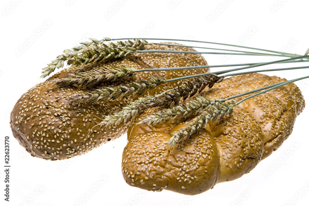 Fototapeta premium Wheat and bread on white background