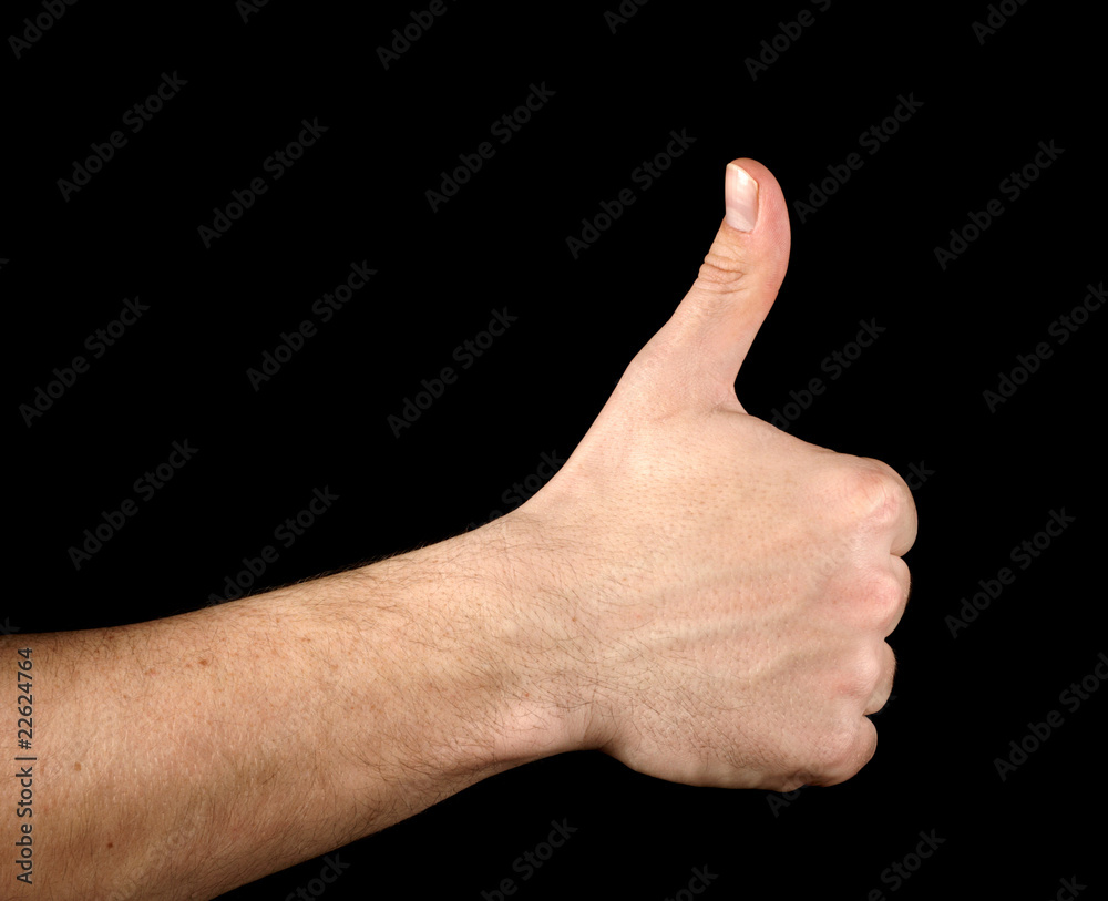 Thumb up hand isolated on black background Thumb up hand isolated on black background
