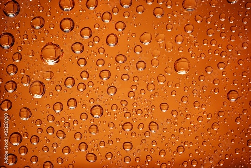water drops in orange light