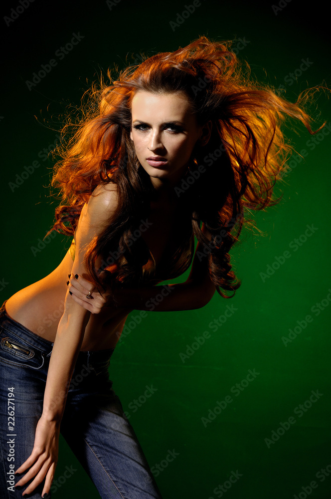 Sexy fashion dancing model on light background Sexy fashion dancing model on light background