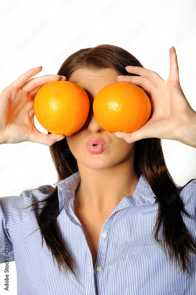 young beautiful woman with citrus orange fruit having fun young beautiful woman with citrus orange fruit having fun