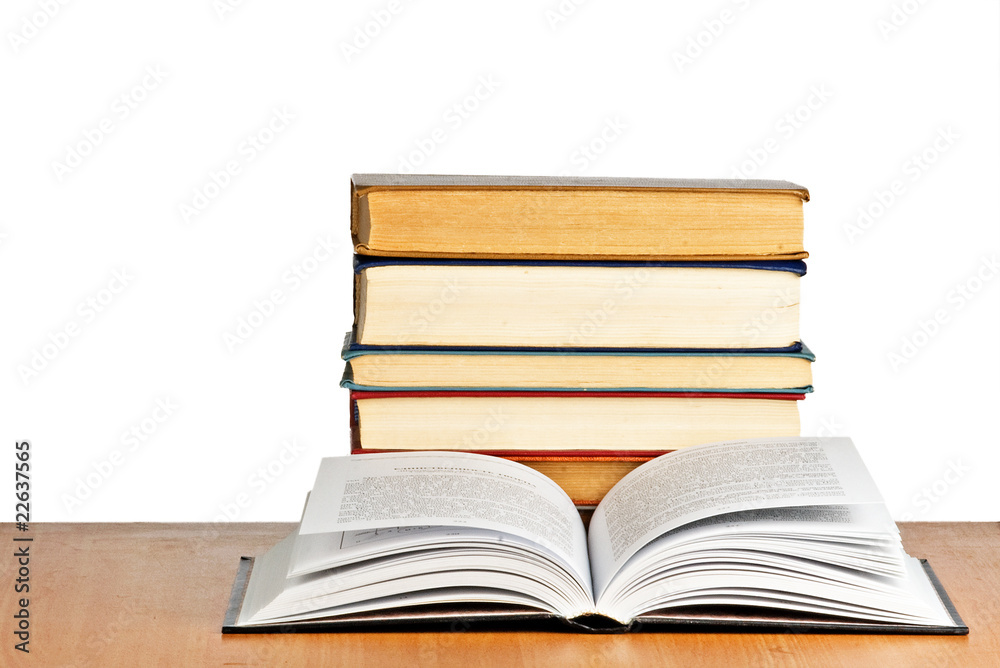 Open book on desk on white background Open book on desk on white background