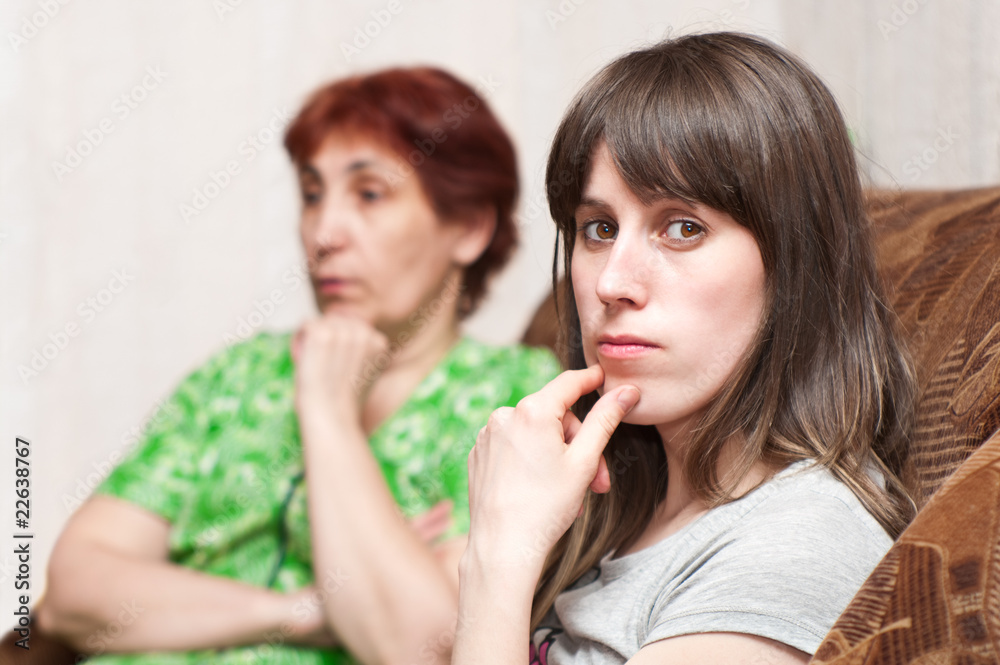 Mature woman mother and young girl daughter have fallen out Mature woman mother and young girl daughter have fallen out