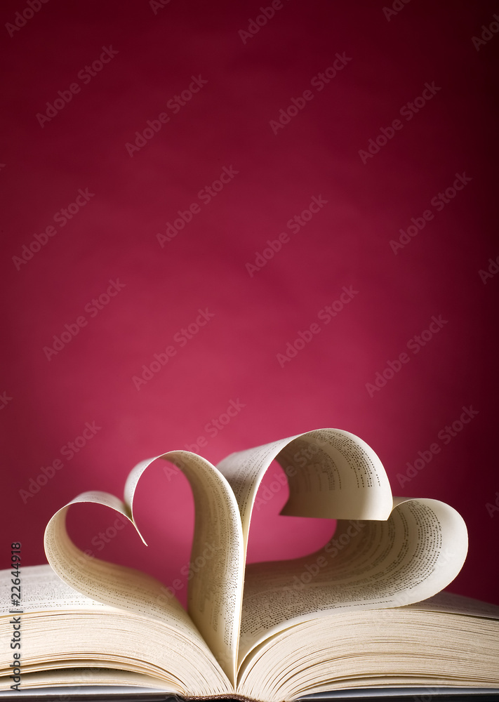 Opened book and heart shape
