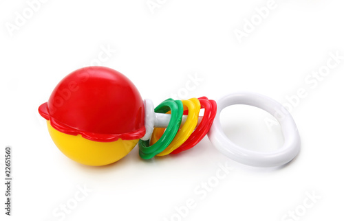 Baby rattle on white background photo