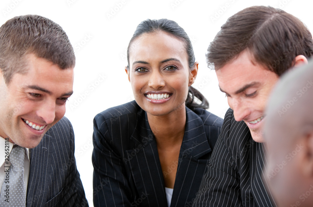 Beautiful businesswoman smiling at the camera in a meeting Beautiful businesswoman smiling at the camera in a meeting