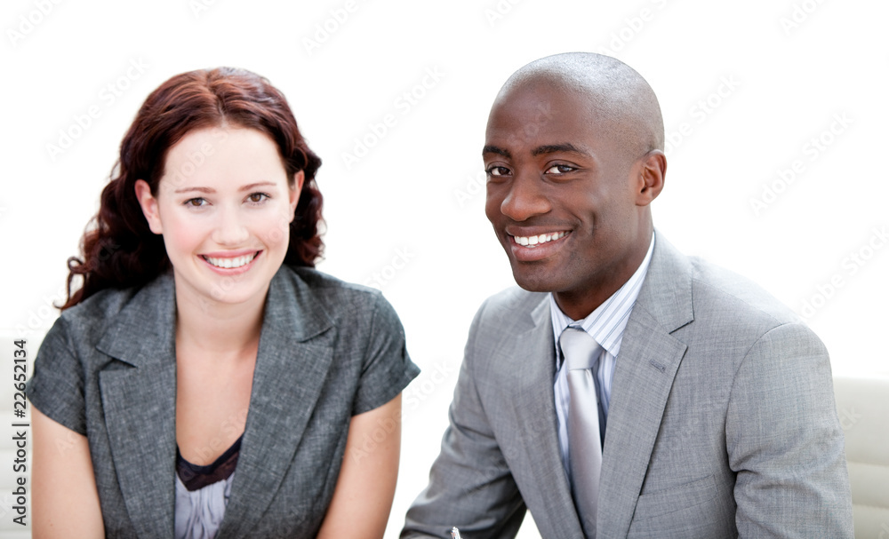 Two business partners smiling at the camera Two business partners smiling at the camera