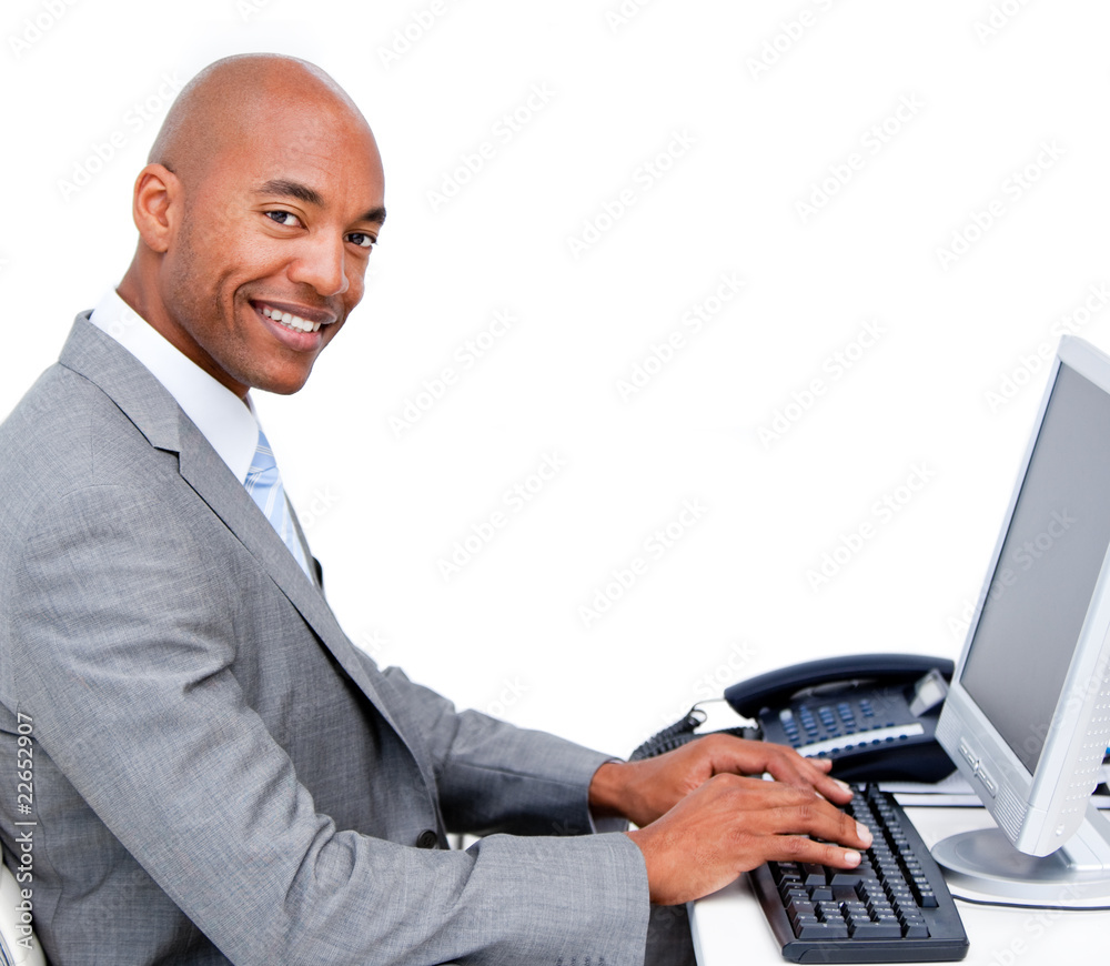 Handsome businessman working at a computer Handsome businessman working at a computer