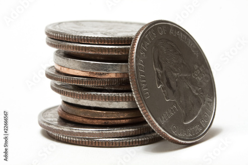 Φωτογραφία Leaning quarter and a stack of coins
