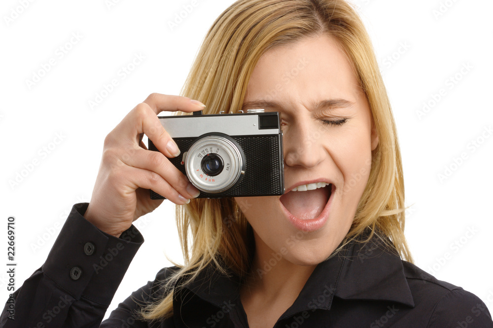 young woman taking a shot with photo camera young woman taking a shot with photo camera