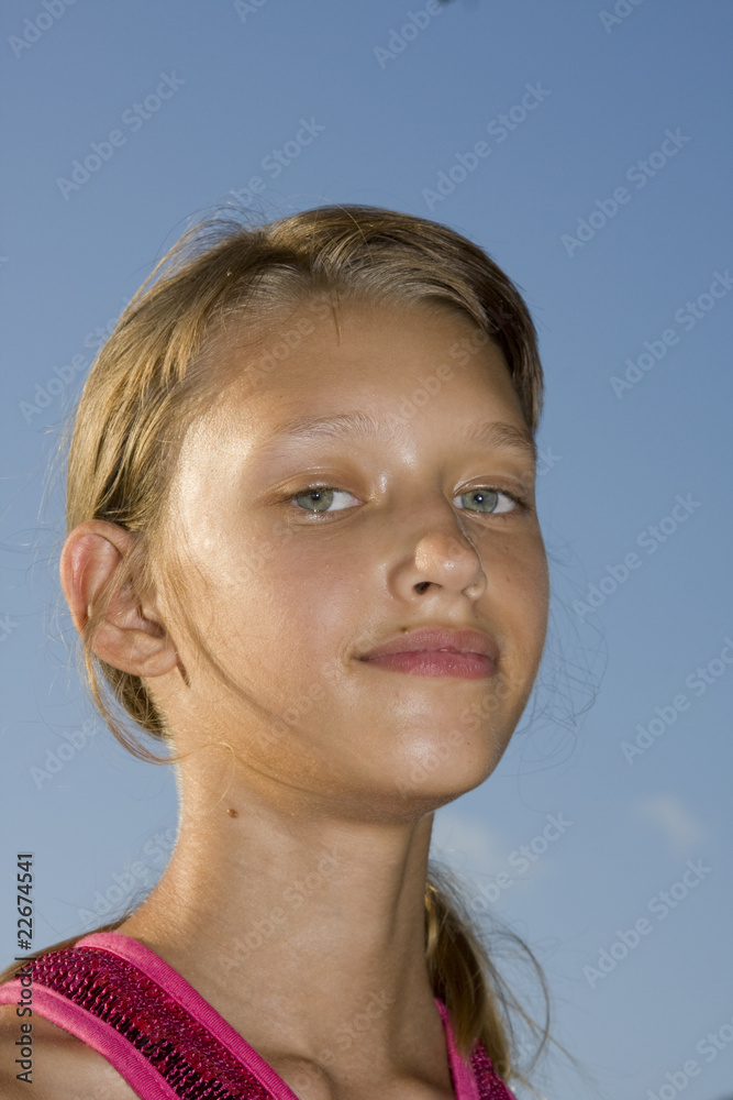 Closeup portrait of charming young girl smiling Closeup portrait of charming young girl smiling