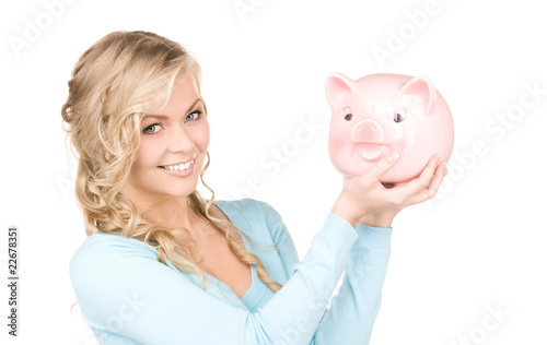 lovely woman with piggy bank