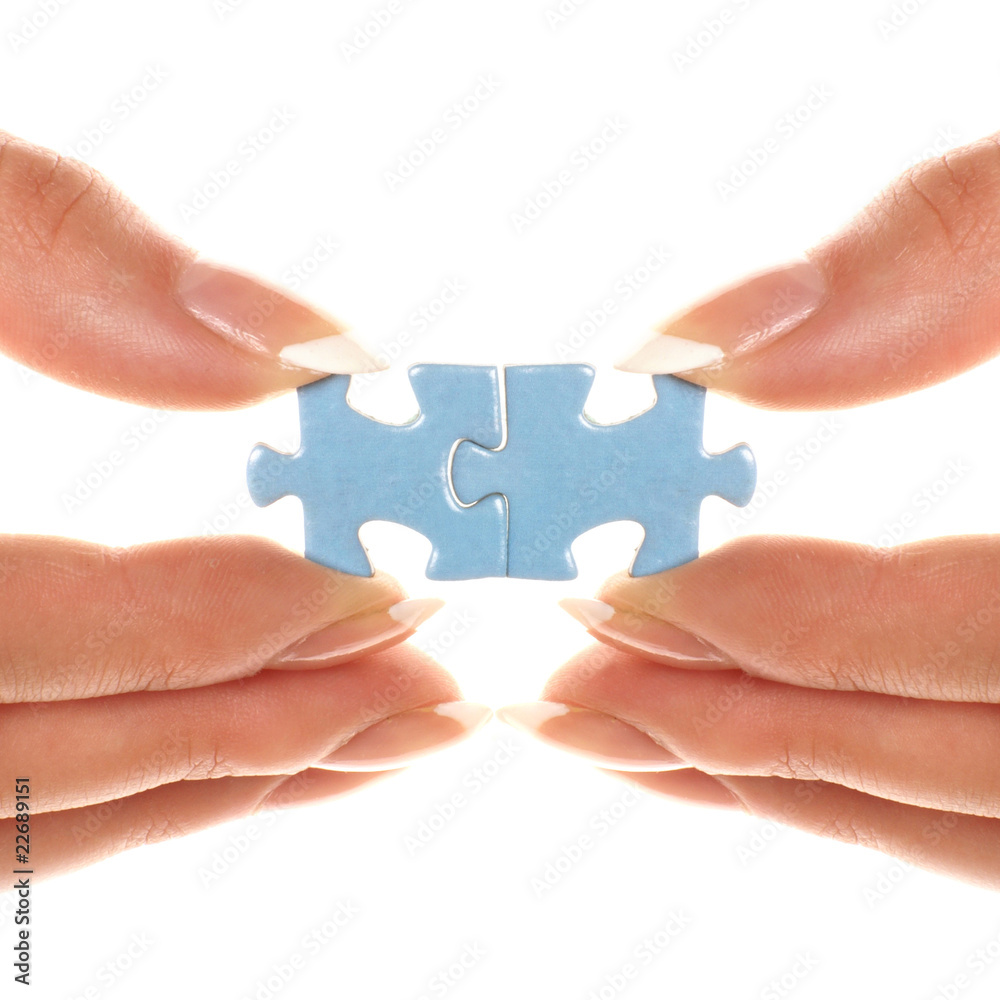 Two light blue pieces of puzzle are connected together Two light blue pieces of puzzle are connected together
