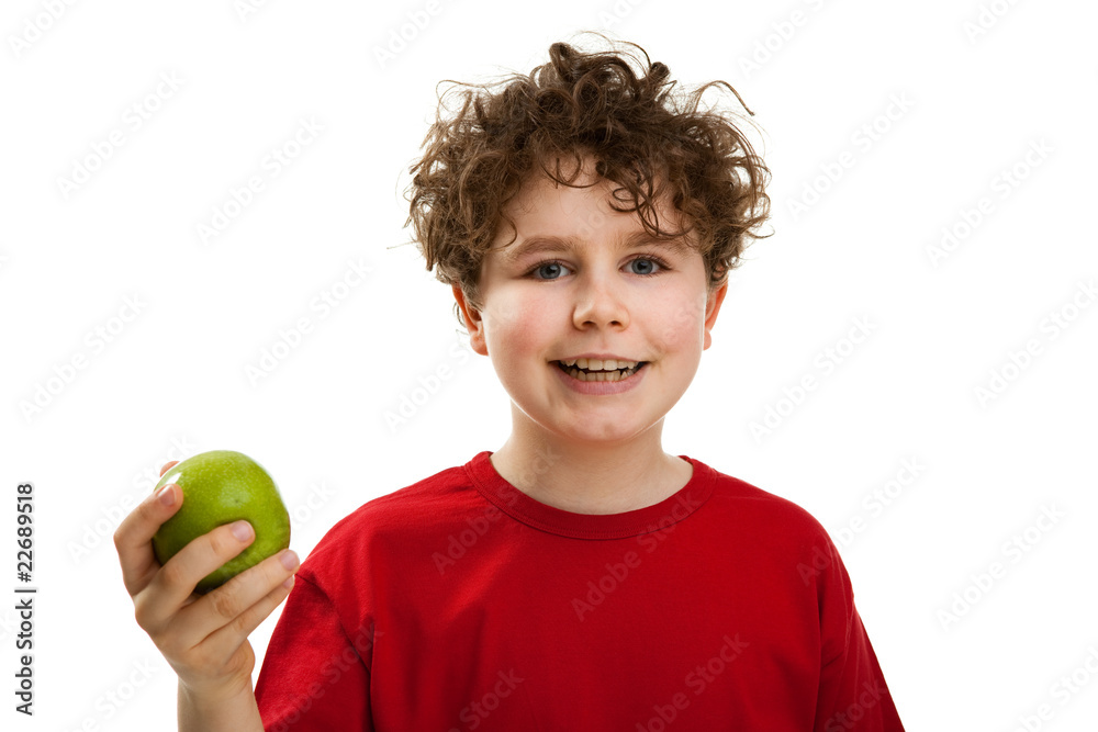 Boy eating green apple isolated on white background
