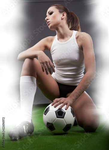 Sexy football player on stadium