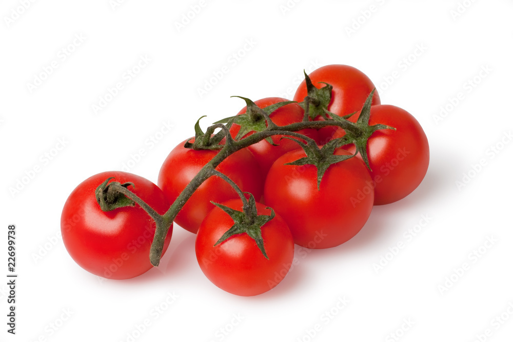 bunch of fresh cherry tomato on white background