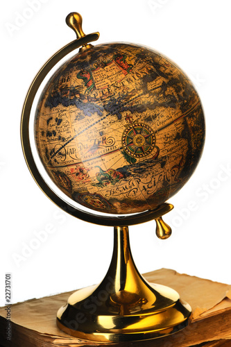 Antique globe on books