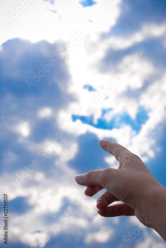 finger pointing at the sky
