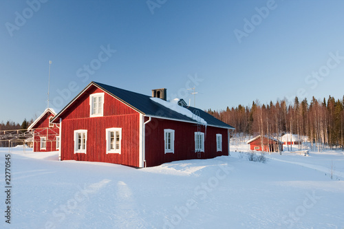 Small wooden houses in winter.