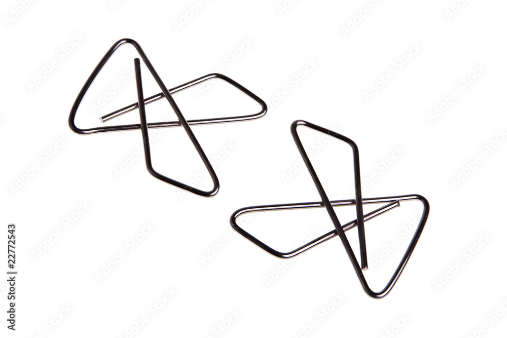 Two big paperclips isolated over white background. Two big paperclips isolated over white background.