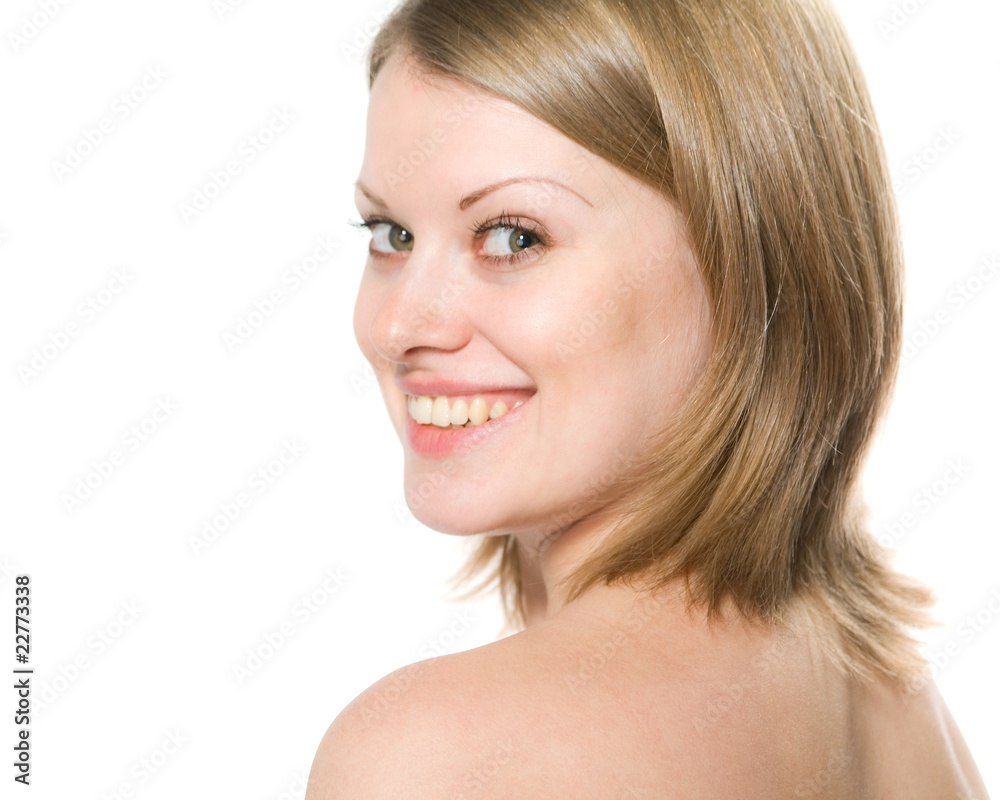 The girl smiles isolated on a white background The girl smiles isolated on a white background