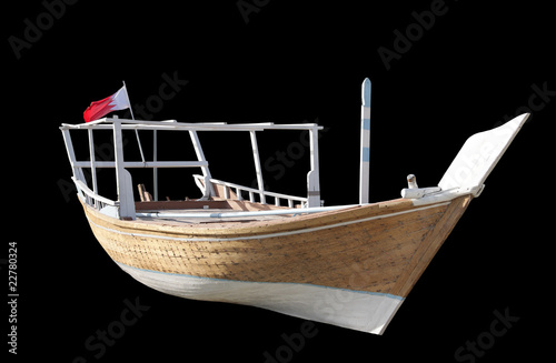 A typical traditional arabian fishing dhow isolated on black