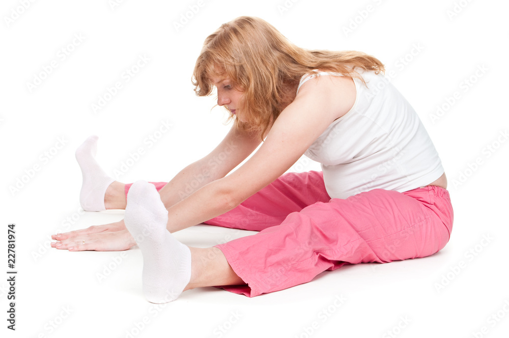 Pregnant woman making fitness exercises Pregnant woman making fitness exercises